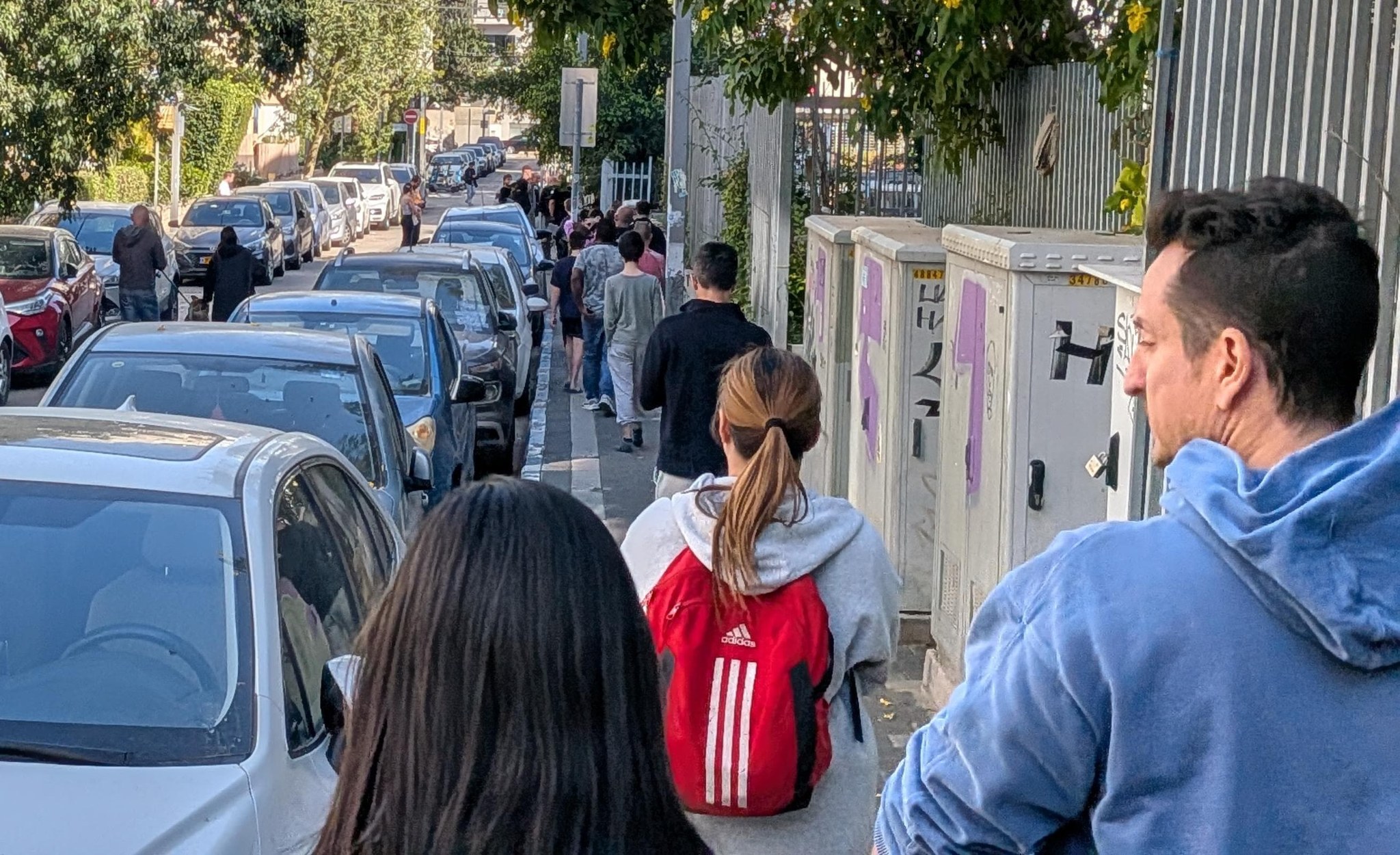 People walking calmly to shelter