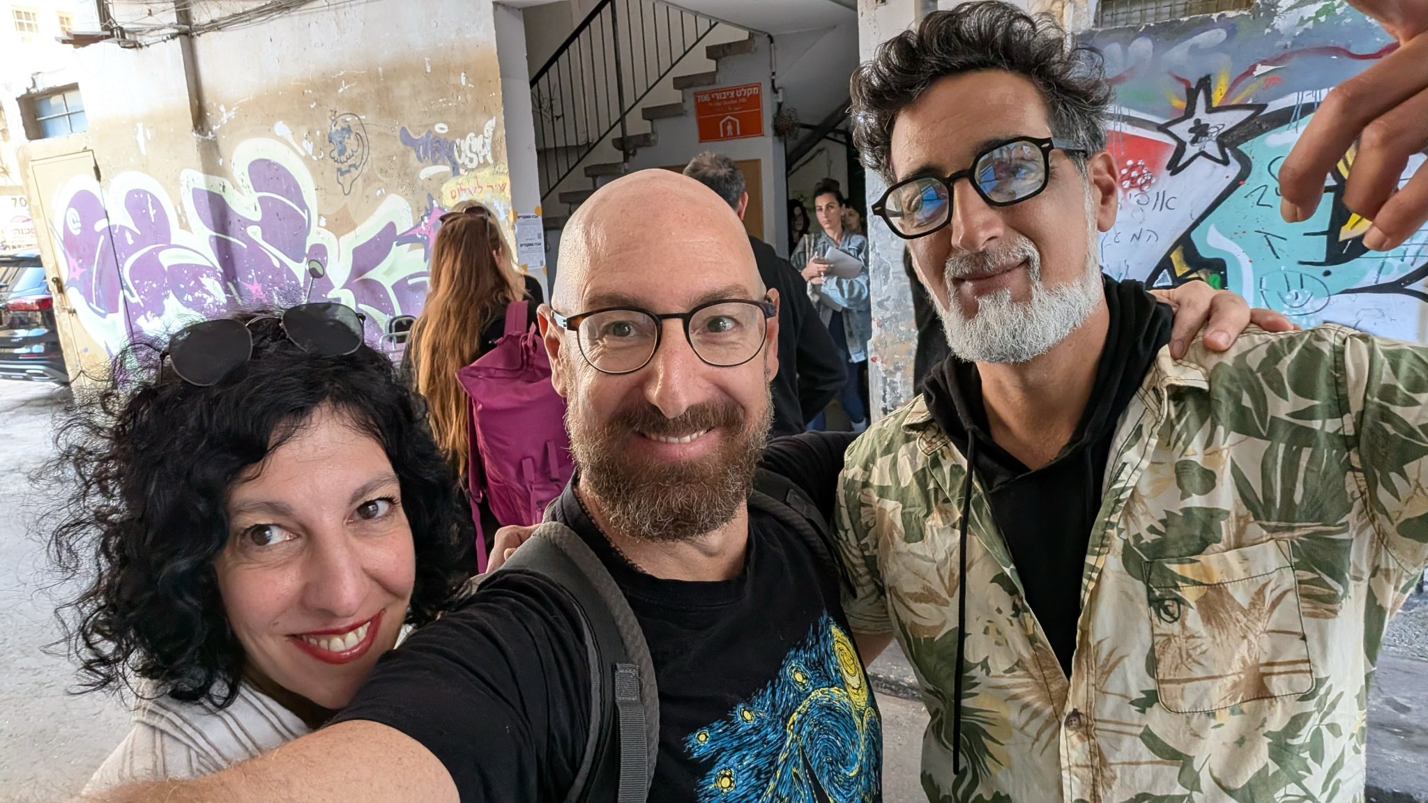 Zvika the amateur comic with friends outside Florentin shelter